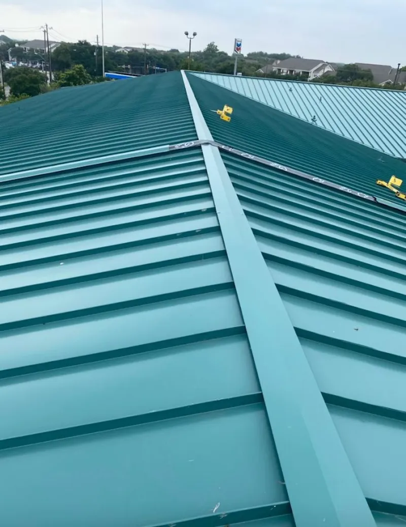 Green commercial metal roof ridge and valley for Metal Roof Repair in Oakland